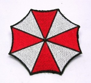 Merchandise - Resident Evil Umbrella Regenschirm B�gelsticker (NEU & OVP)